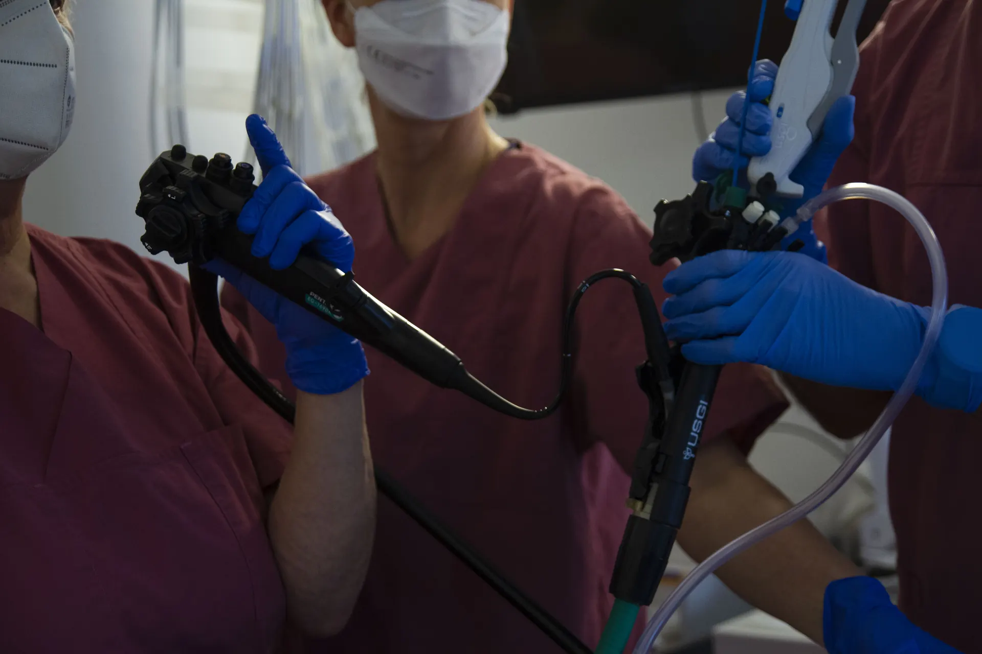 Endoscope in the hands of the treatment team, close-up